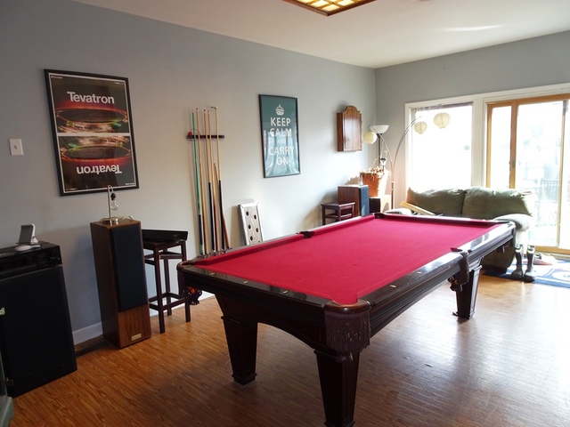 219 West Main Street St. Charles, IL 60174 - Photo 5 of 5 a room with furniture pool table and windows