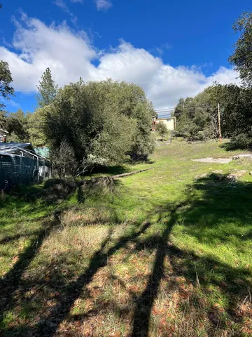a view of lake with green space