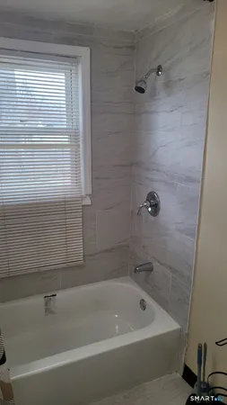 a bathroom with a bathtub