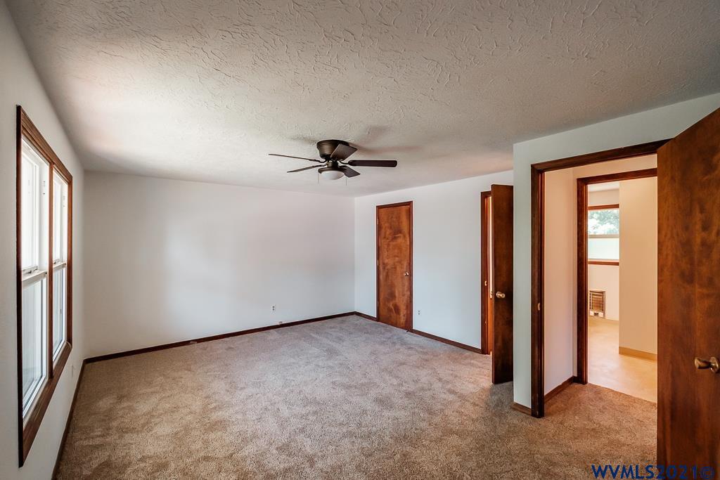 1278 Southwest Maple Street Dallas, OR 97338 - Photo 17 of 42 an empty room with windows and closet