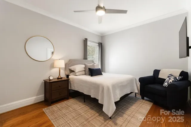 a balcony with couch and outdoor view