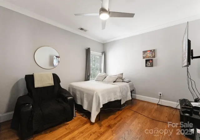 a view of a porch with chairs and backyard