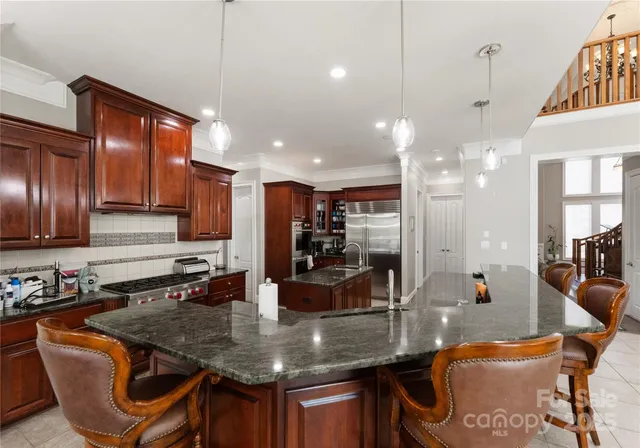 a bedroom with a bed couch and window
