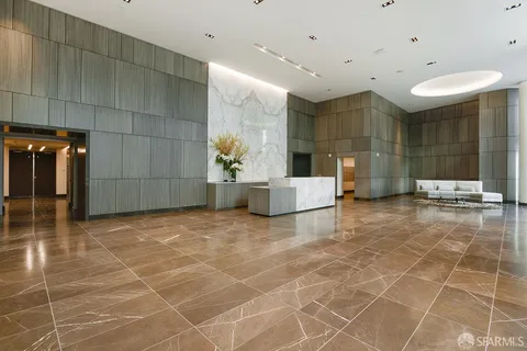 a view of a lobby with gym equipment