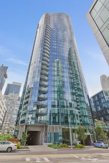 a tall building sitting next to a road