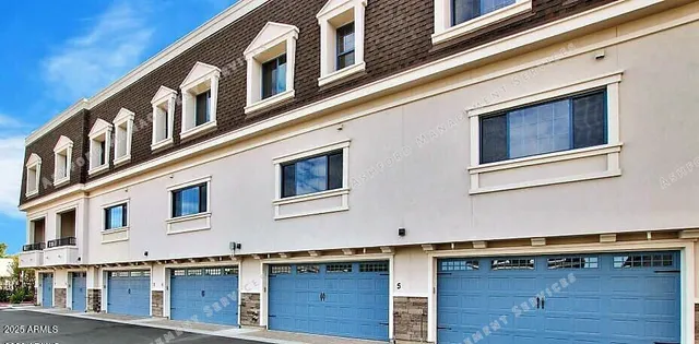 a view of a house with outdoor seating area