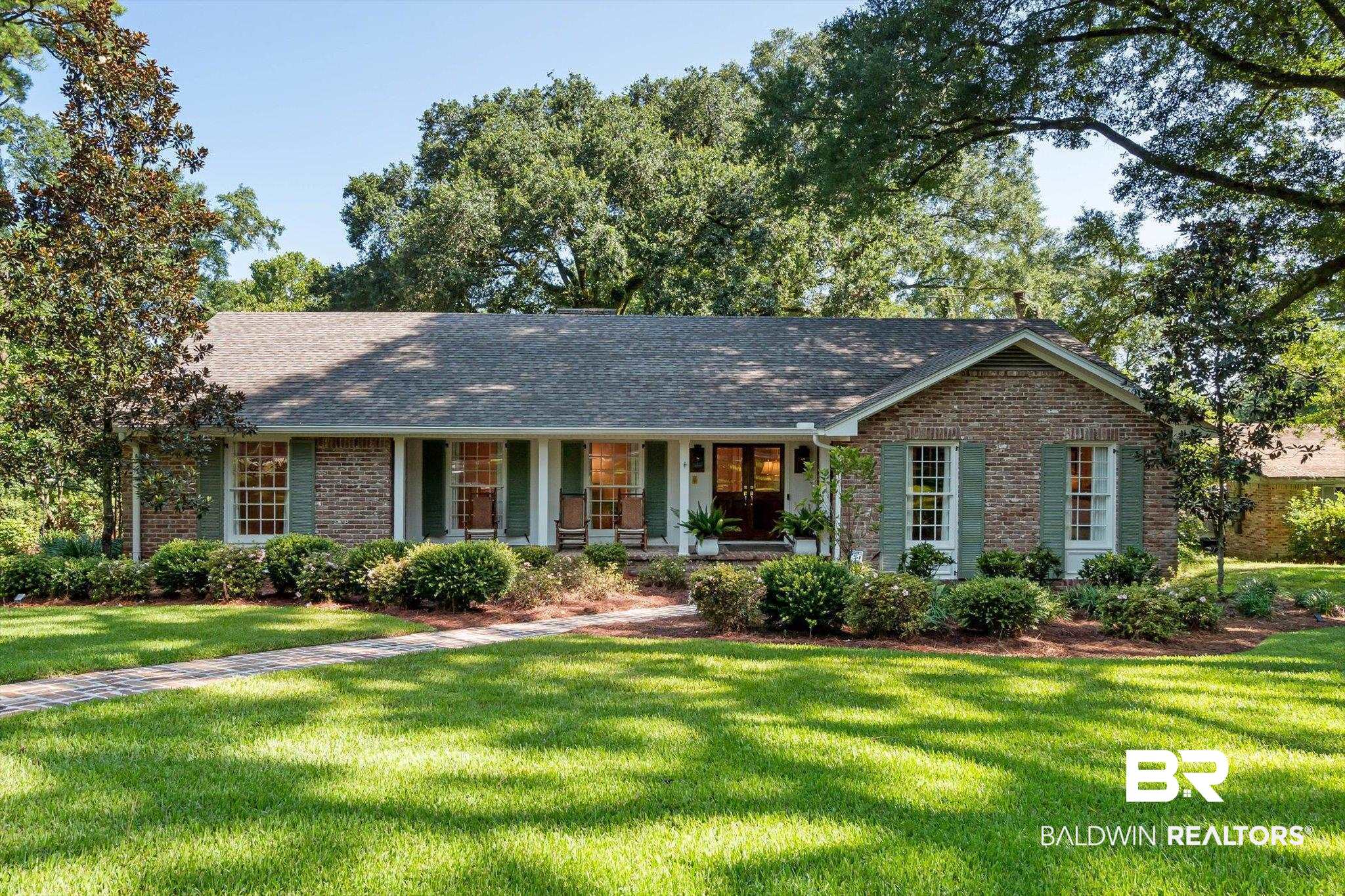 3612 Linden Lane Mobile, AL 36608 - Photo 1 of 42 Ranch-style house with brick siding, a front lawn, and roof with shingles