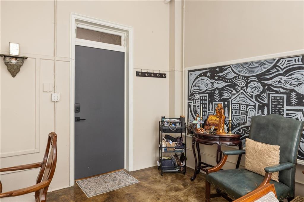 138 Kirkwood Road Northeast, Unit 14 Atlanta, GA 30317 - Photo 6 of 38 a dining room with furniture and wooden floor