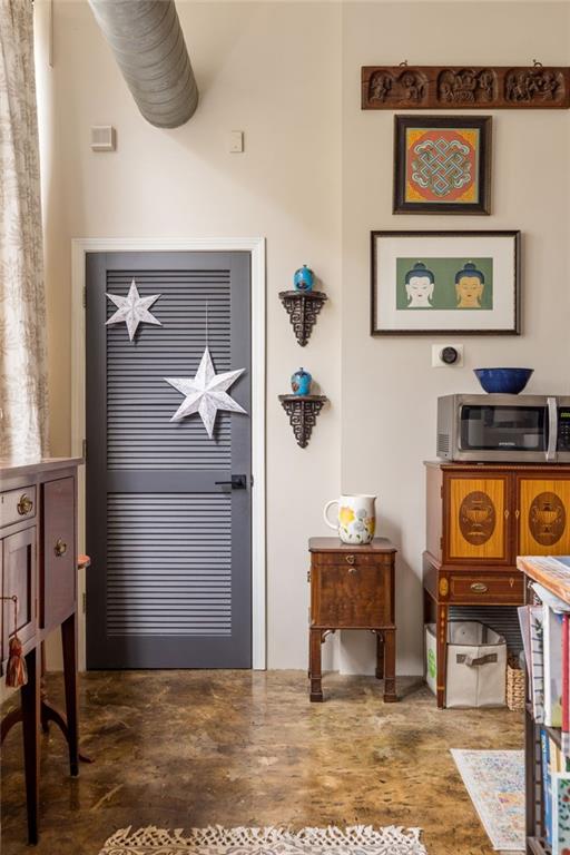 138 Kirkwood Road Northeast, Unit 14 Atlanta, GA 30317 - Photo 9 of 38 a view of a hallway with workspace