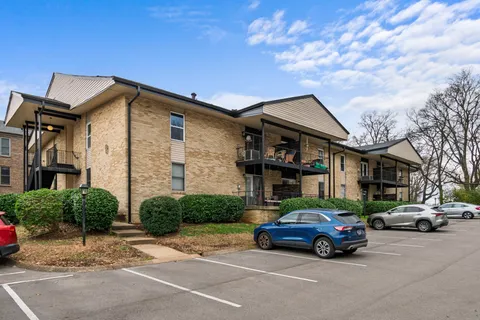 a car parked in front of a building