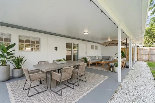 a view of a park with large trees