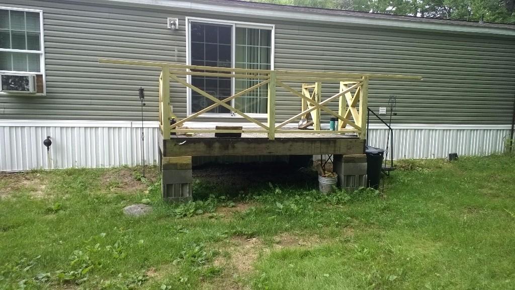 61 Gore Road Naples, ME 04055 - Photo 5 of 33 New rear deck in the process of...
