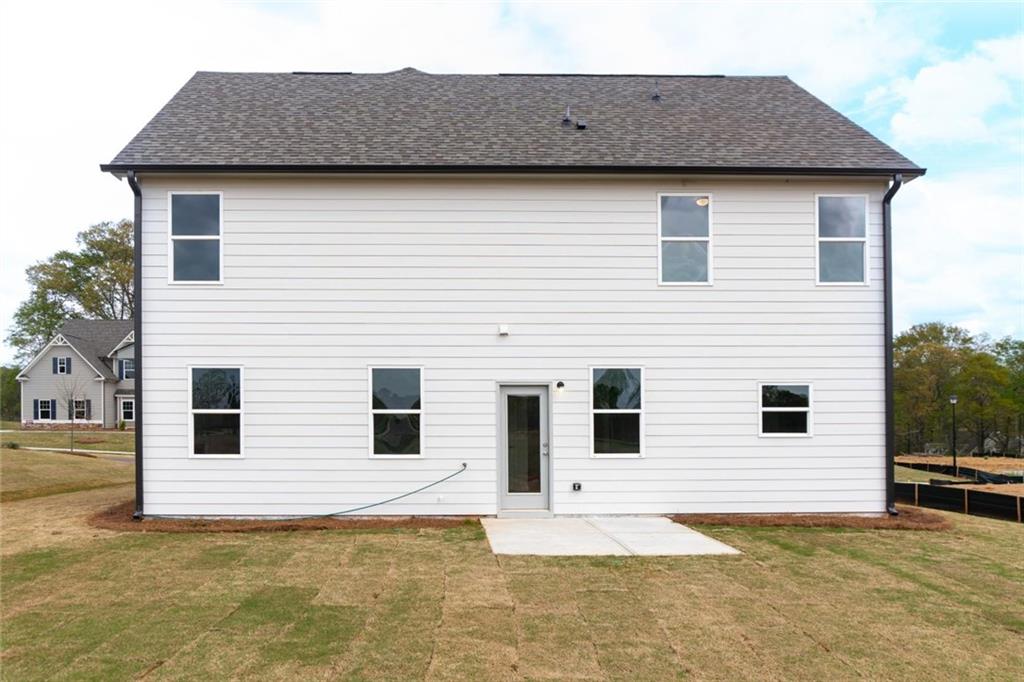 74 Hampton Ridge Way Jefferson, GA 30549 - Photo 15 of 15 a view of a house with backyard