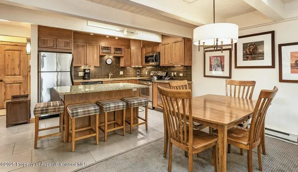a view of a dining room with furniture