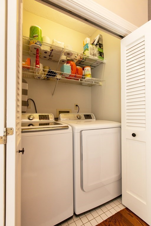 1193 Main Street, Unit A2 Hingham, MA 02043 - Photo 17 of 27 a utility room with dryer and washer