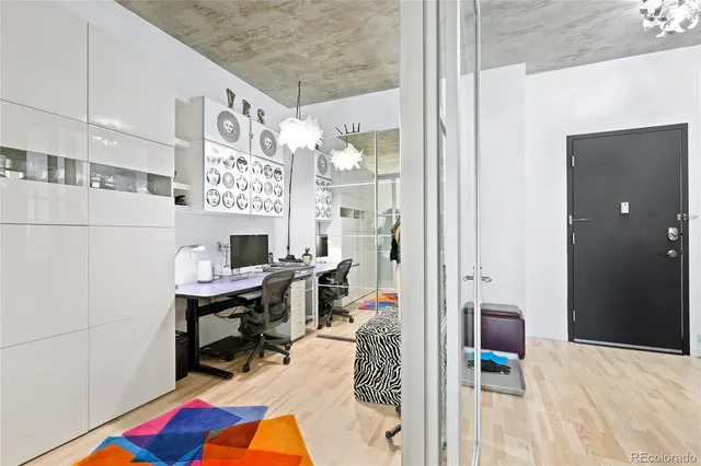 a workspace with furniture and a fireplace