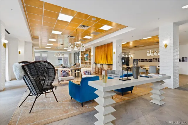 a view of a swimming pool with an outdoor seating