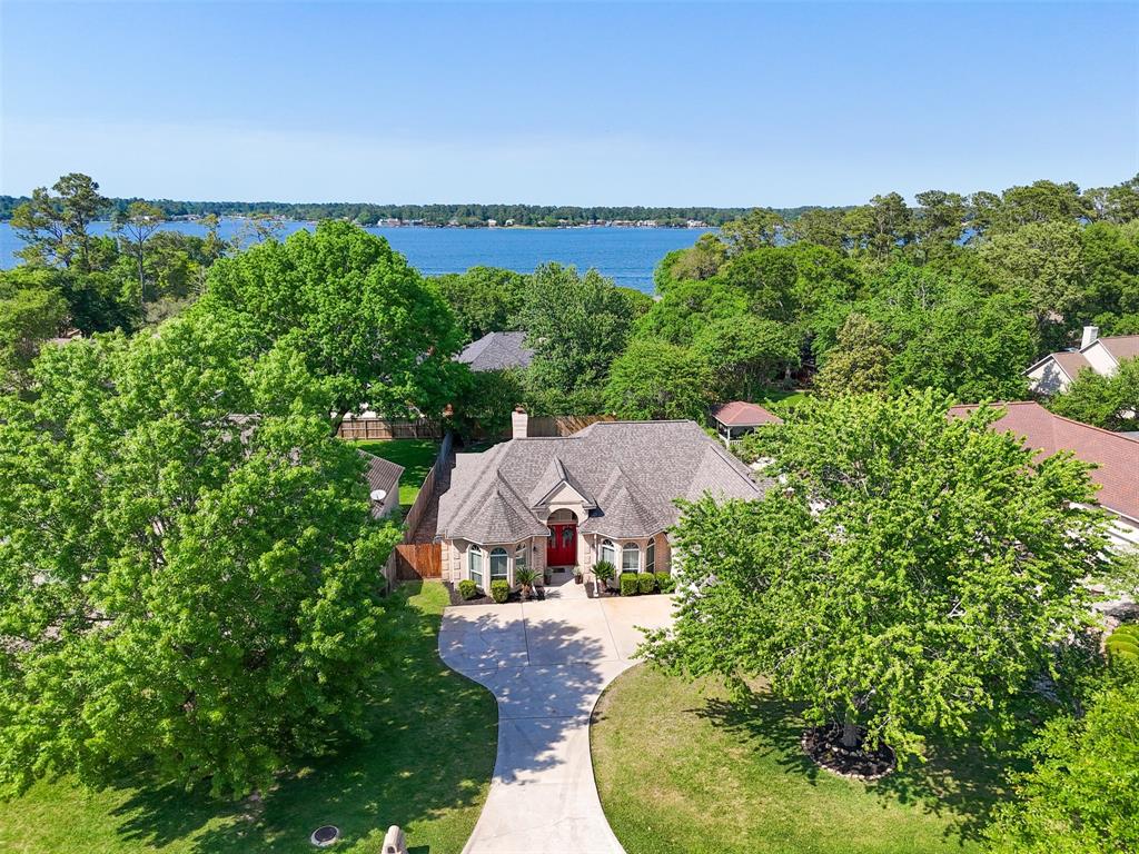 129 April Point Place Conroe, TX 77356 - Photo 1 of 40 an aerial view of a house