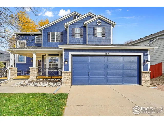 a view of a house with pool and chairs