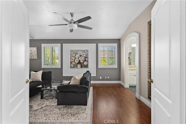 a living room with furniture and a window