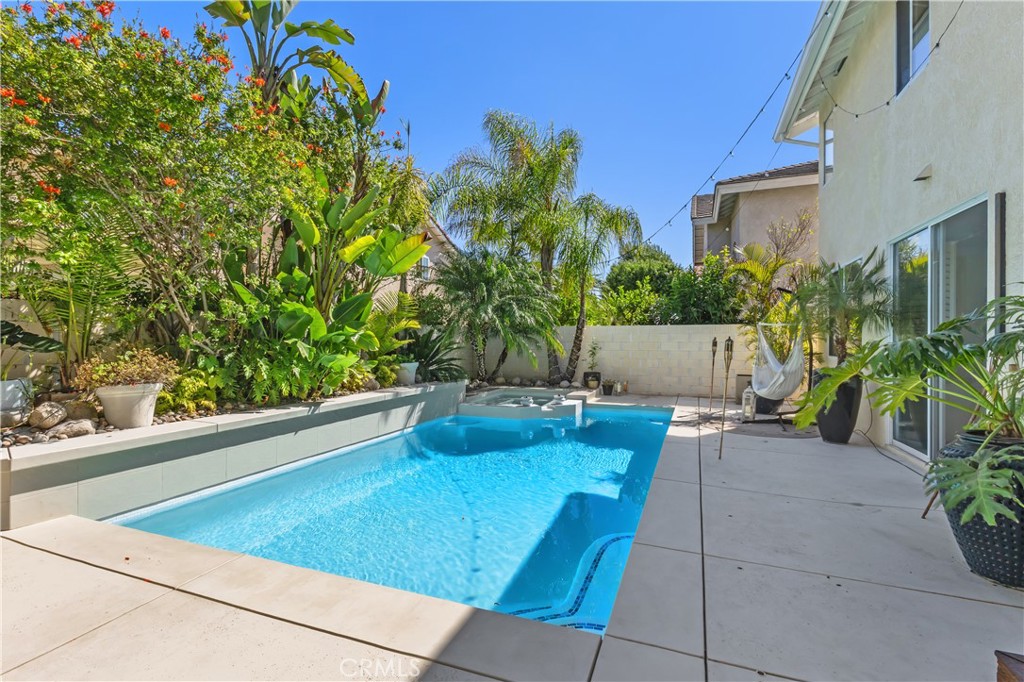 13668 Kingsbridge Street Westminster, CA 92683 - Photo 26 of 36 a view of backyard with outdoor seating and plants