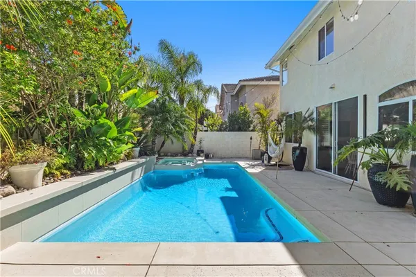 a backyard of a house with seating space