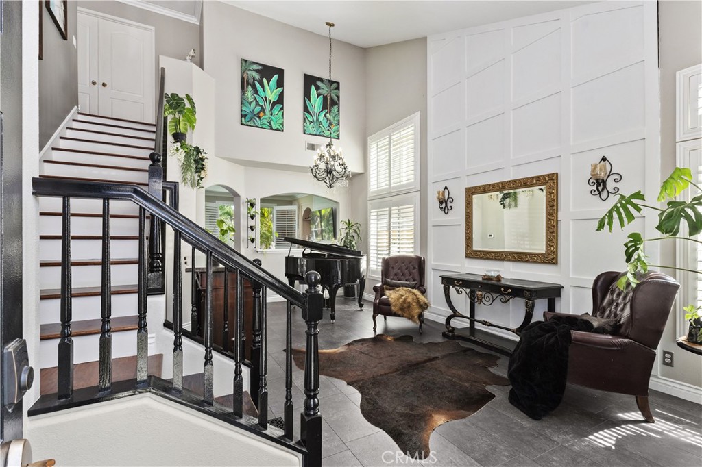 13668 Kingsbridge Street Westminster, CA 92683 - Photo 5 of 36 a living room with furniture and a wooden floor