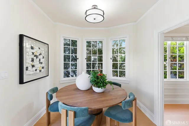 a bedroom with a bed and a mirror