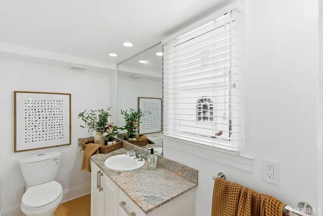 a workspace with furniture and window