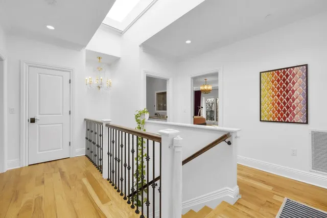 a view of a hallway with workspace