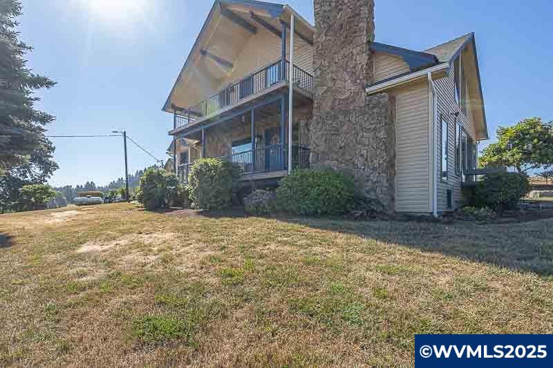 11660 Simpson Road Monmouth, OR 97361 - Photo 43 of 50 a view of a house with a yard
