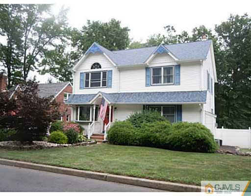 150 Kimberly Road Colonia, NJ 07067 - Photo 1 of 10 a house view with a garden