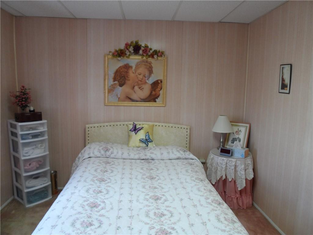 130 Harrison Avenue Butler, PA 16001 - Photo 12 of 24 a bedroom with a bed and a cabinets