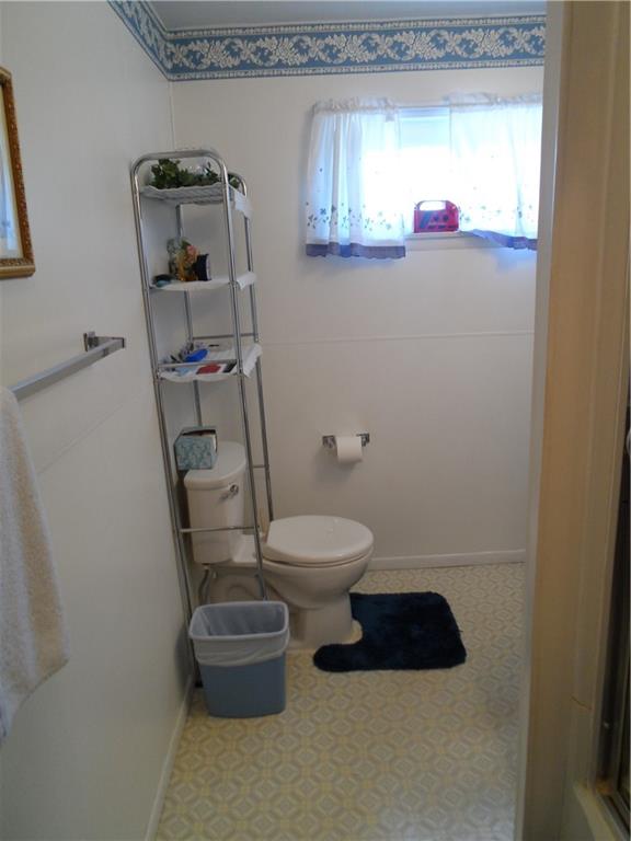 130 Harrison Avenue Butler, PA 16001 - Photo 15 of 24 a bathroom with a toilet and a shower