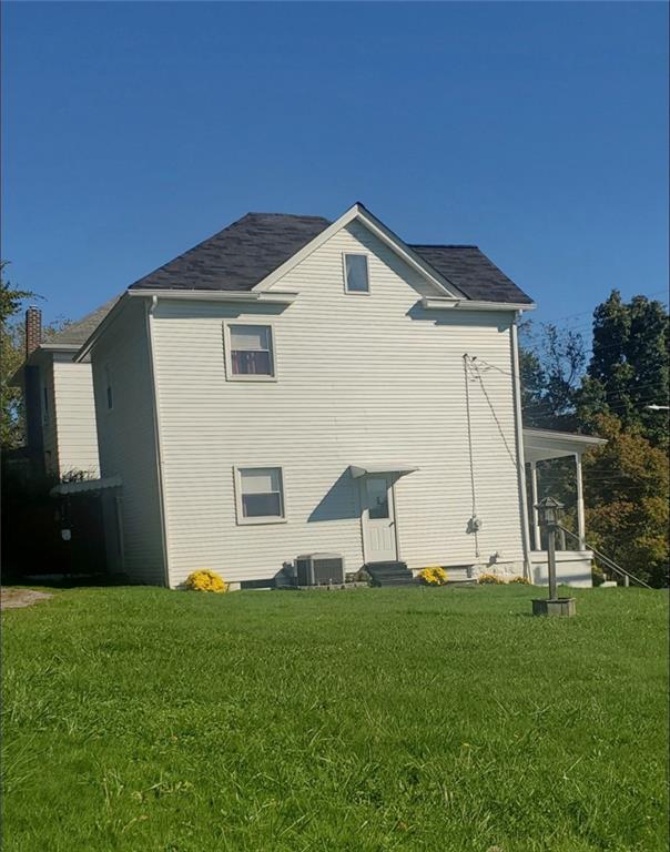 130 Harrison Avenue Butler, PA 16001 - Photo 2 of 24 a view of an house with backyard space and garden