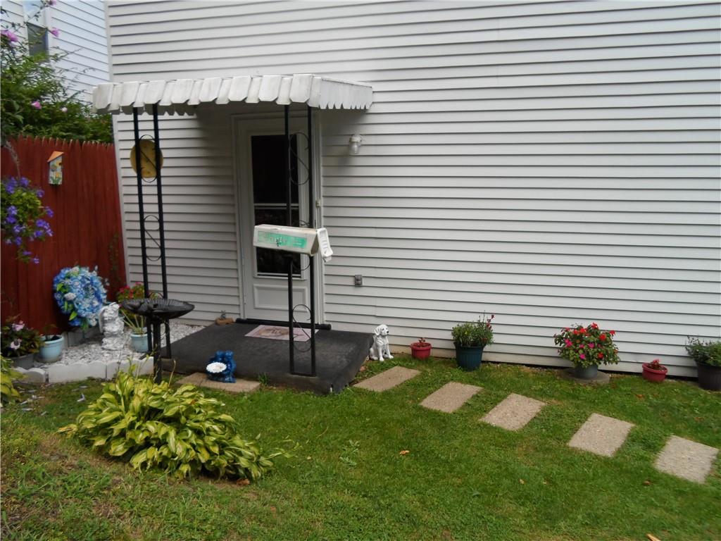 130 Harrison Avenue Butler, PA 16001 - Photo 22 of 24 a backyard of a house with table and chairs