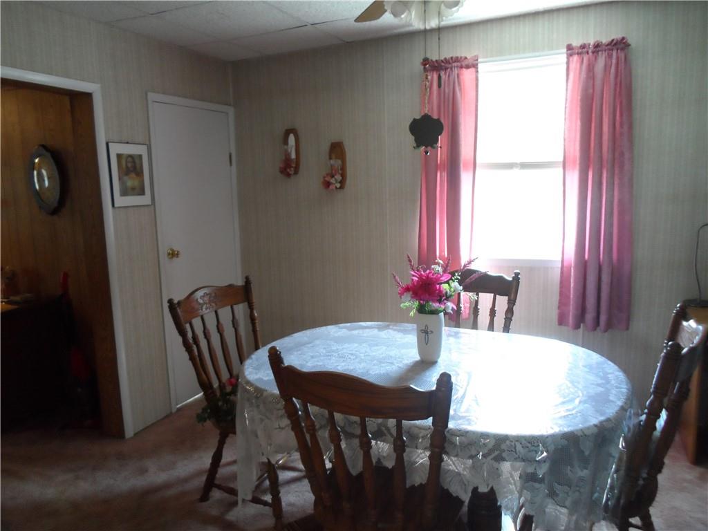 130 Harrison Avenue Butler, PA 16001 - Photo 6 of 24 a view of a dining room with furniture and window