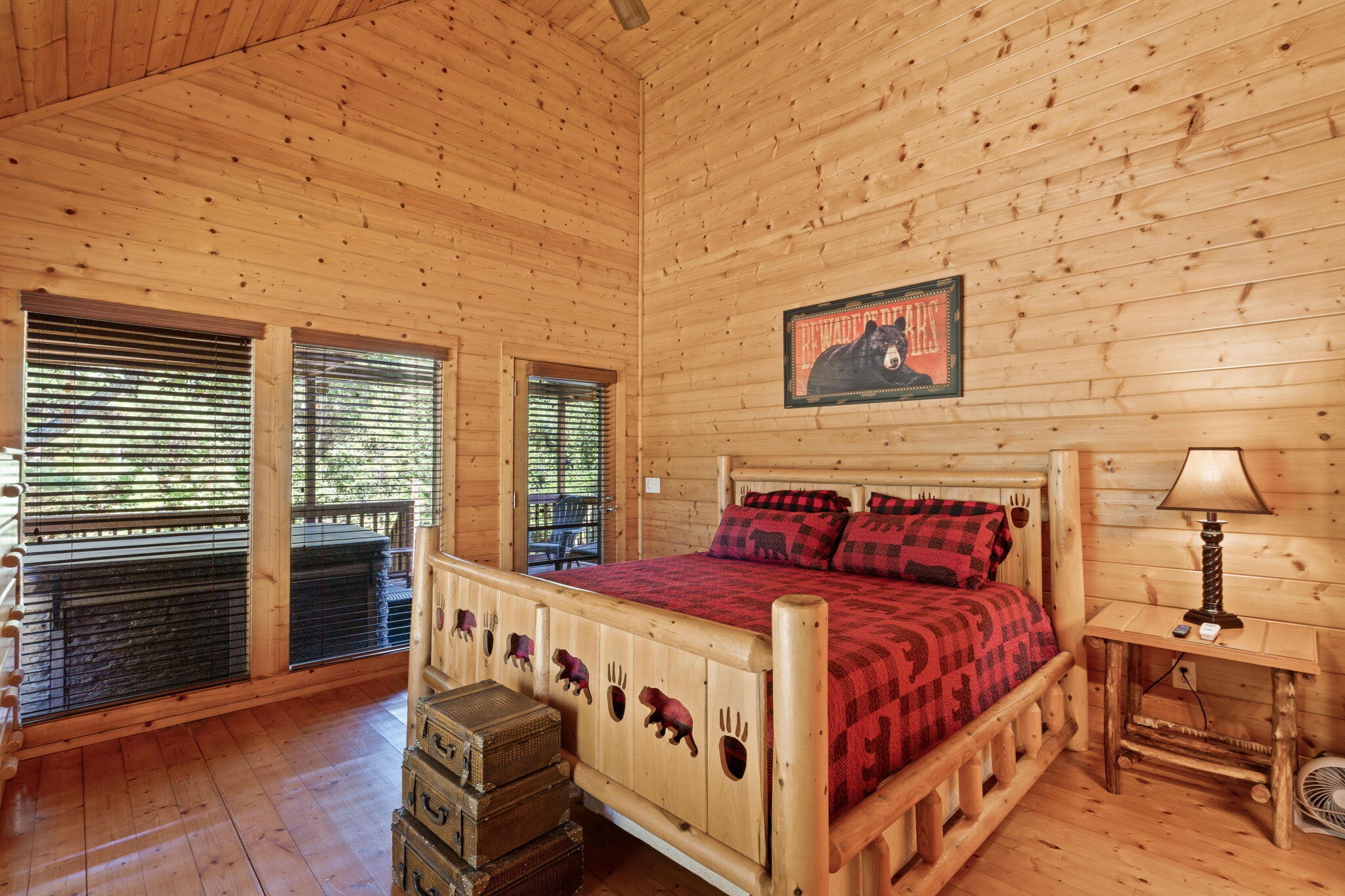 947 Belltown Road Copperhill, TN 37317 - Photo 10 of 26 a large bed sitting in a bedroom next to a window