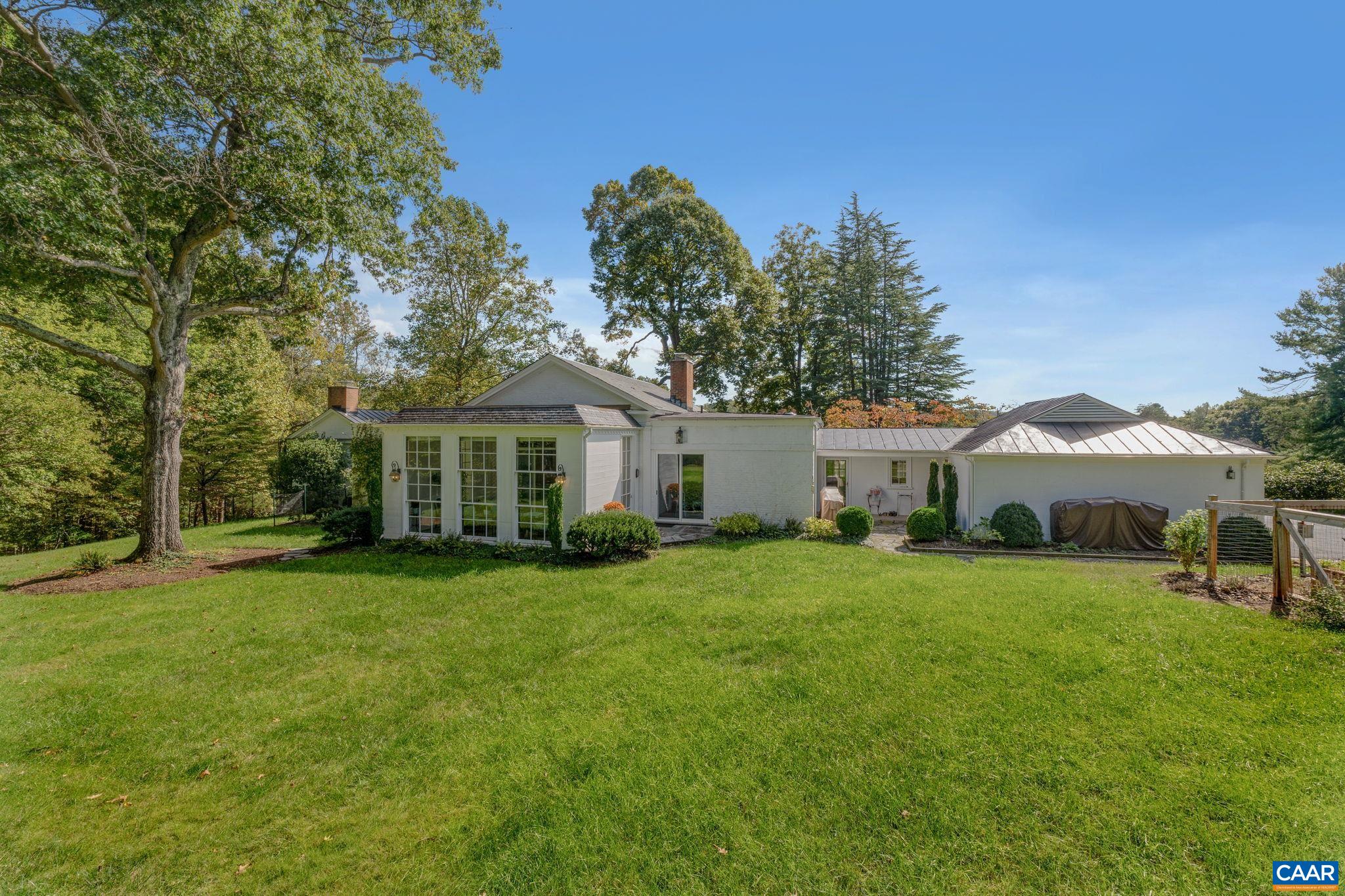 987 Turner Mountain Road Charlottesville, VA 22903 - Photo 53 of 63 a front view of a house with a garden