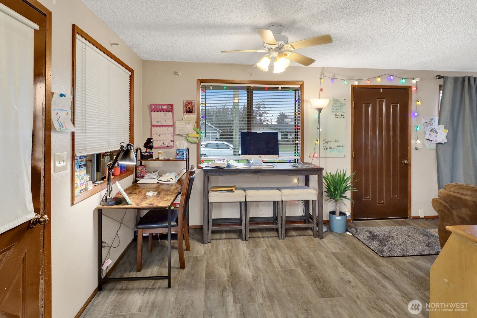 908 Liberty Street Lynden, WA 98264 - Photo 12 of 27 a view of a livingroom with furniture and a window