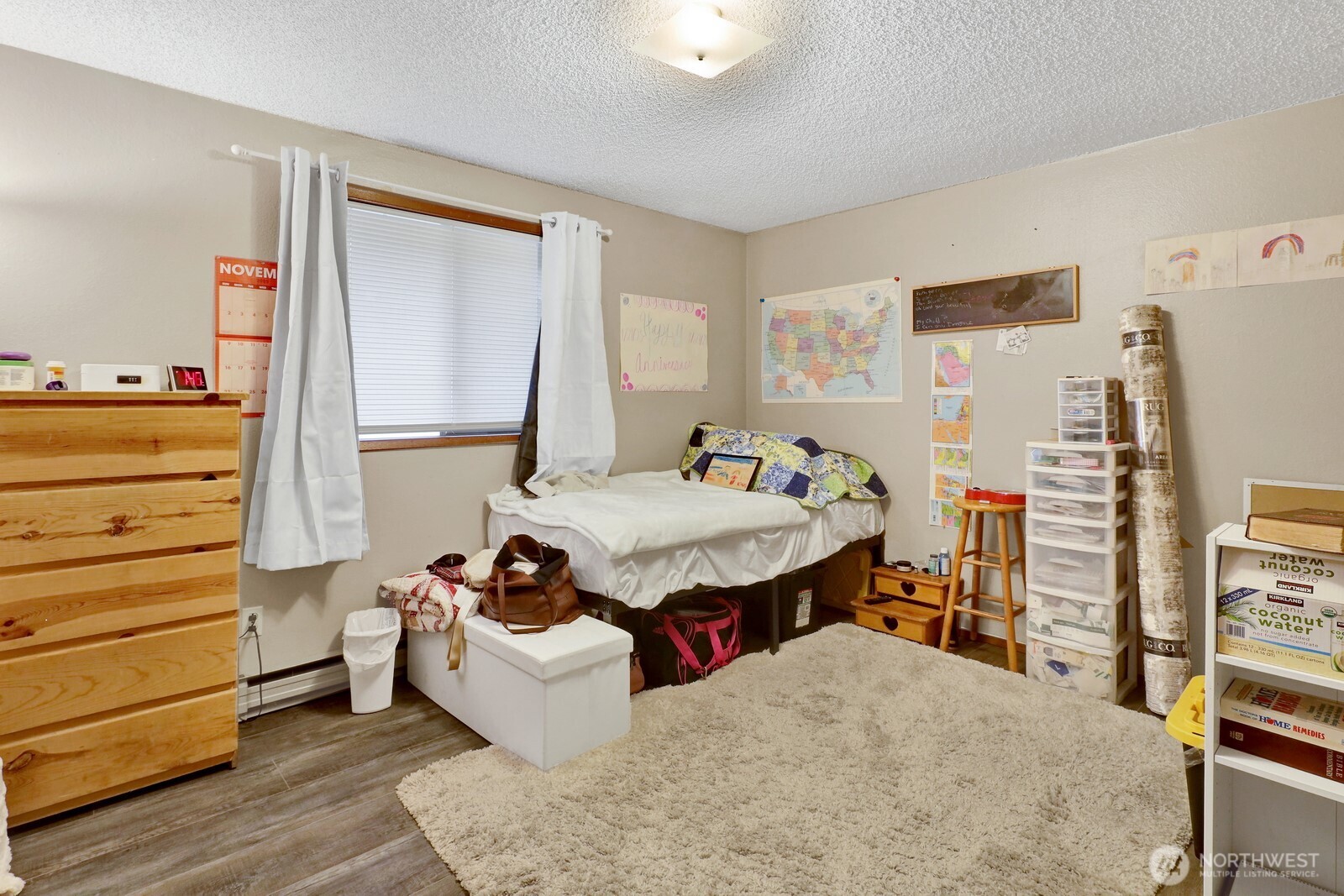 908 Liberty Street Lynden, WA 98264 - Photo 13 of 27 a bed room with a bed and a window