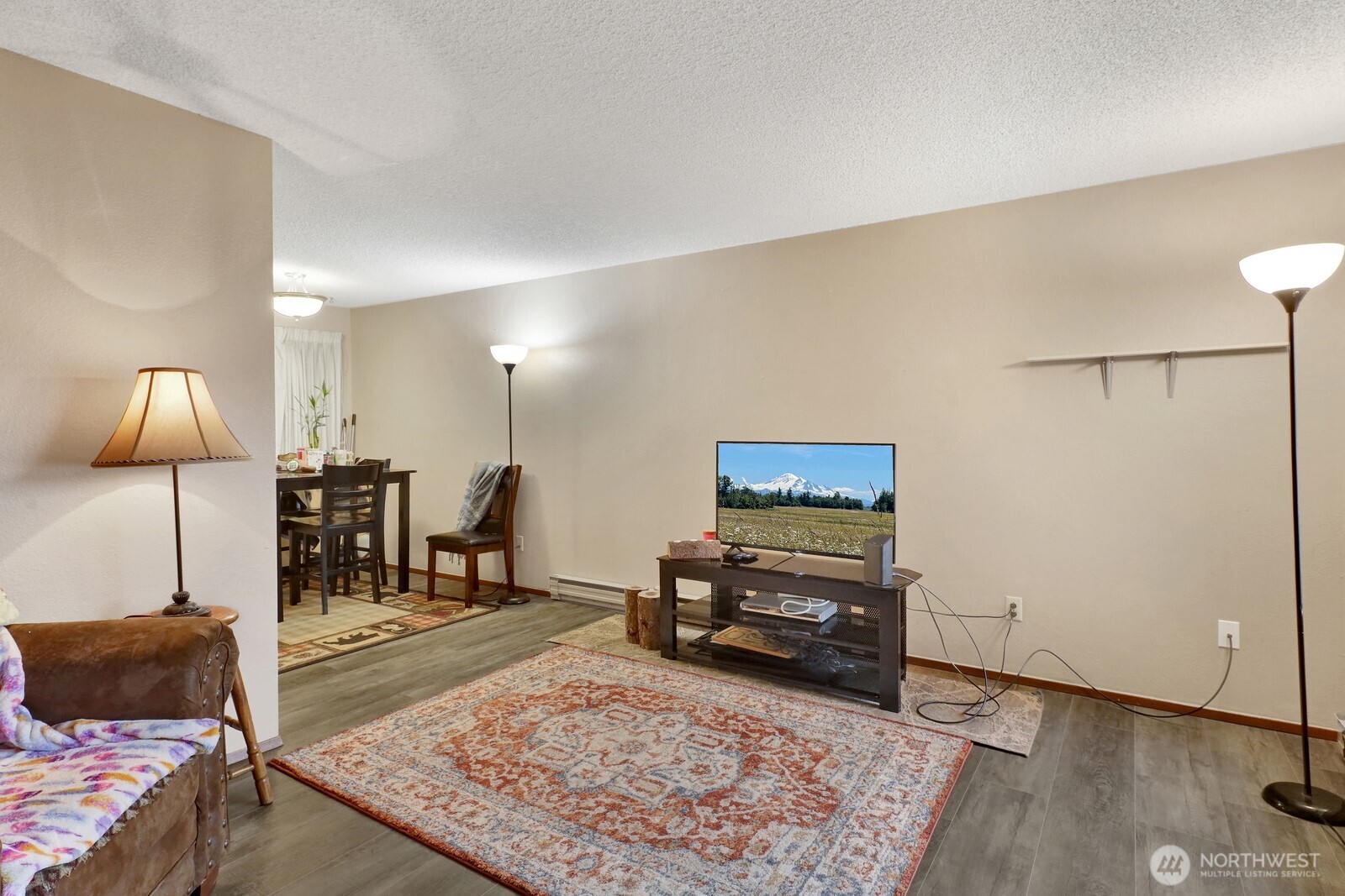 908 Liberty Street Lynden, WA 98264 - Photo 20 of 27 a living room with furniture and a rug