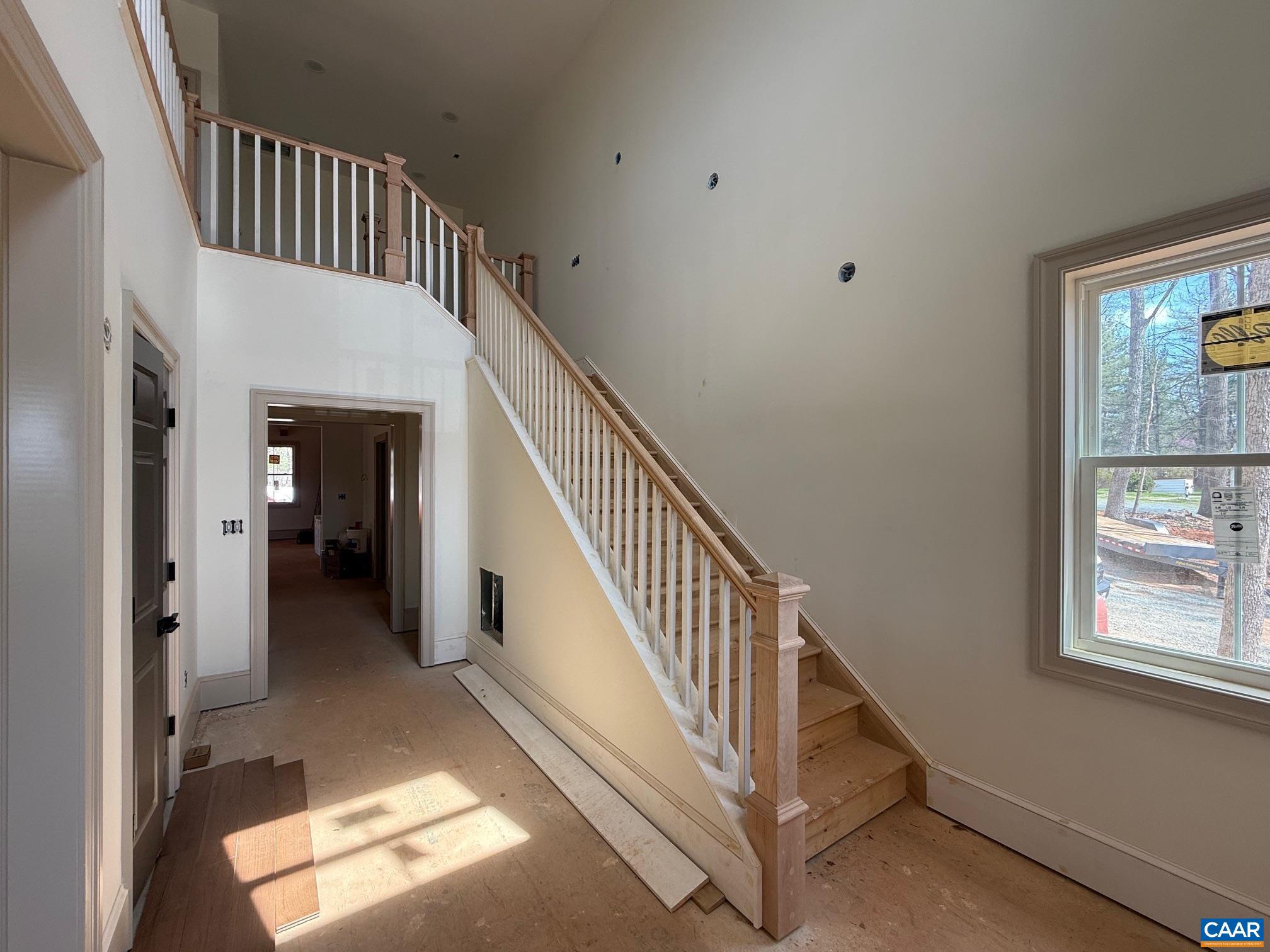 4360 Garth Road Crozet, VA 22932 - Photo 14 of 52 a view of staircase with white walls and a window