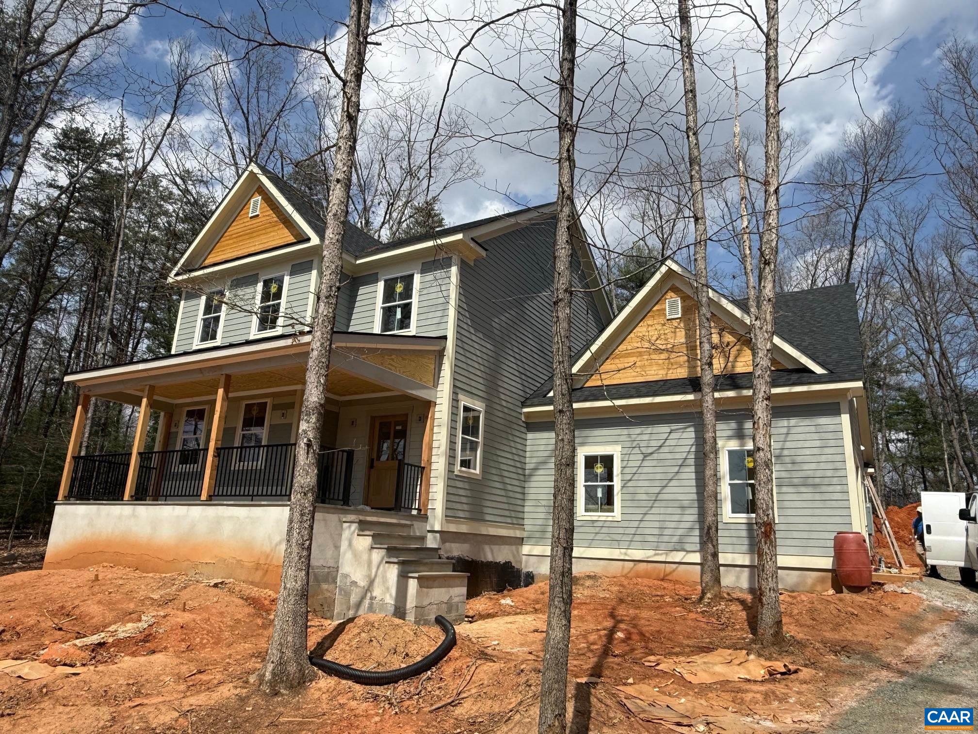 4360 Garth Road Crozet, VA 22932 - Photo 4 of 52 a front view of a house with garden