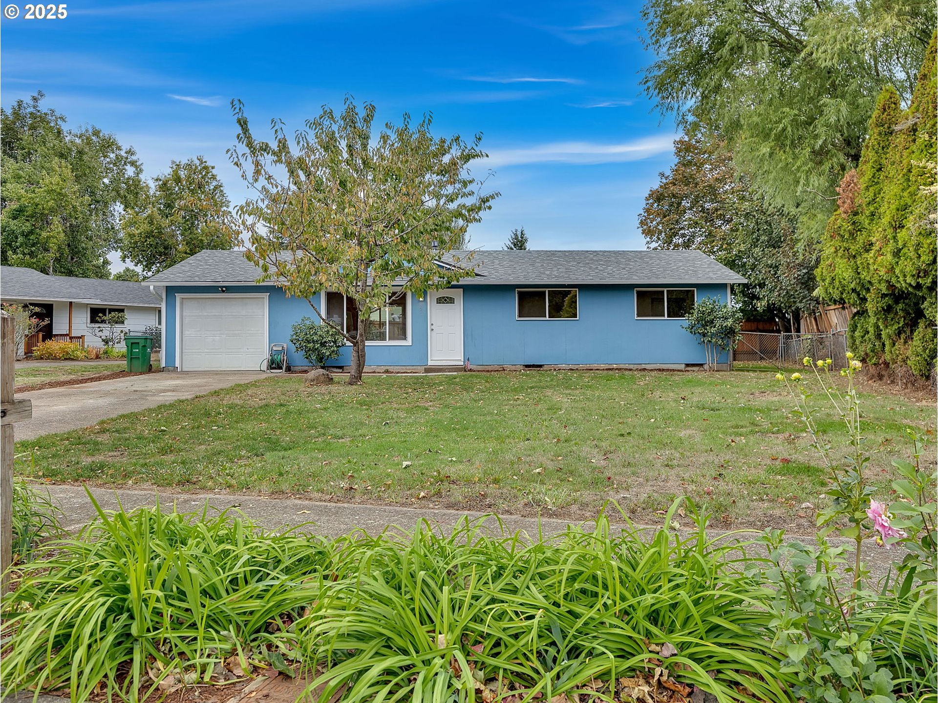 821 Southwest 14th Street Troutdale, OR 97060 - Photo 1 of 27 a front view of a house with garden