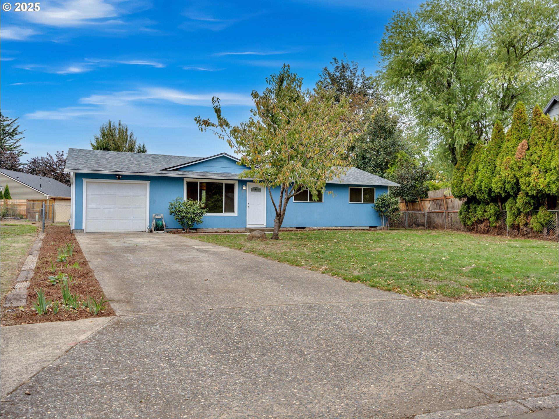 821 Southwest 14th Street Troutdale, OR 97060 - Photo 2 of 27 a front view of house with yard and green space