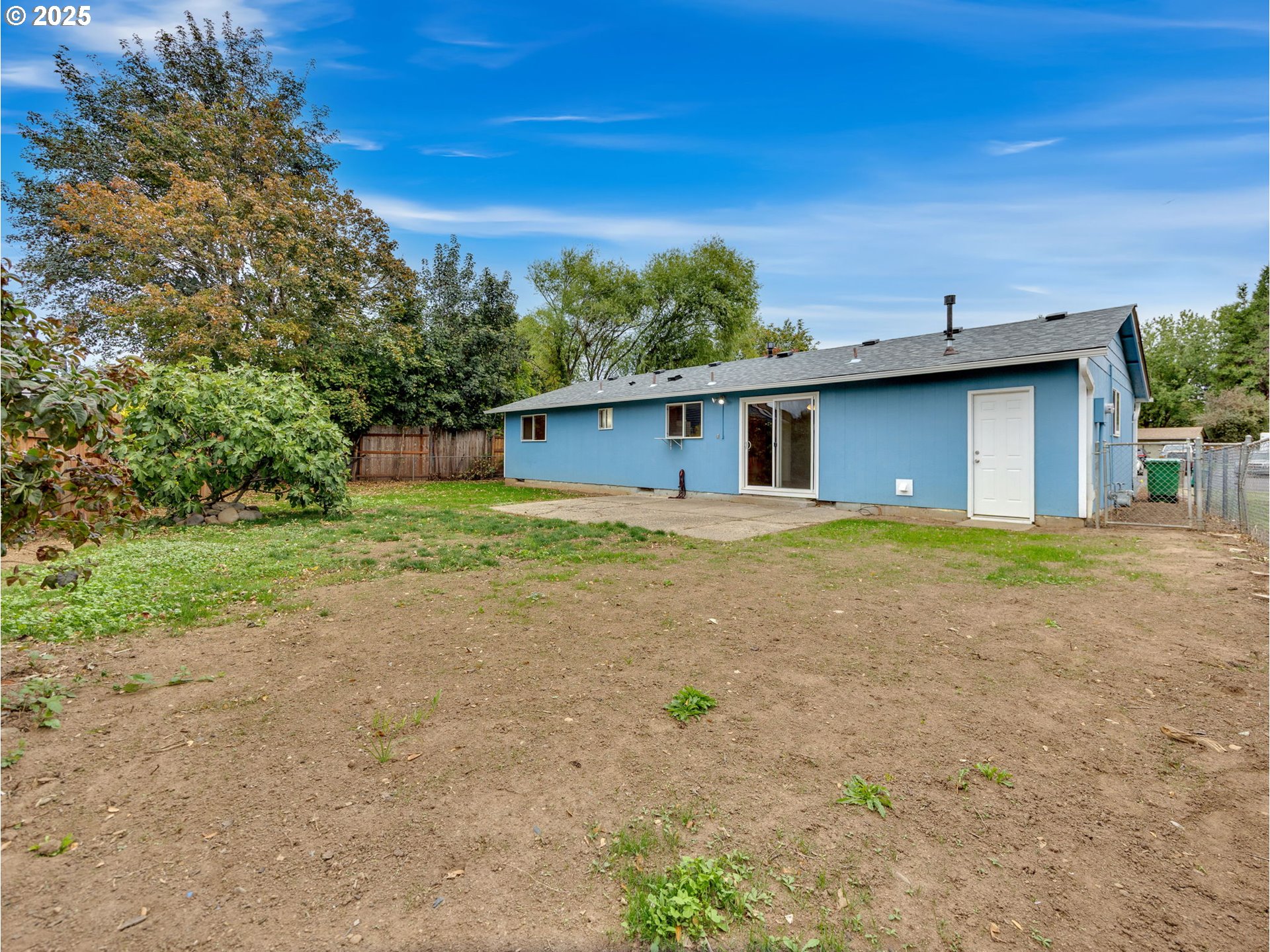 821 Southwest 14th Street Troutdale, OR 97060 - Photo 24 of 27 a view of a house with backyard and trees