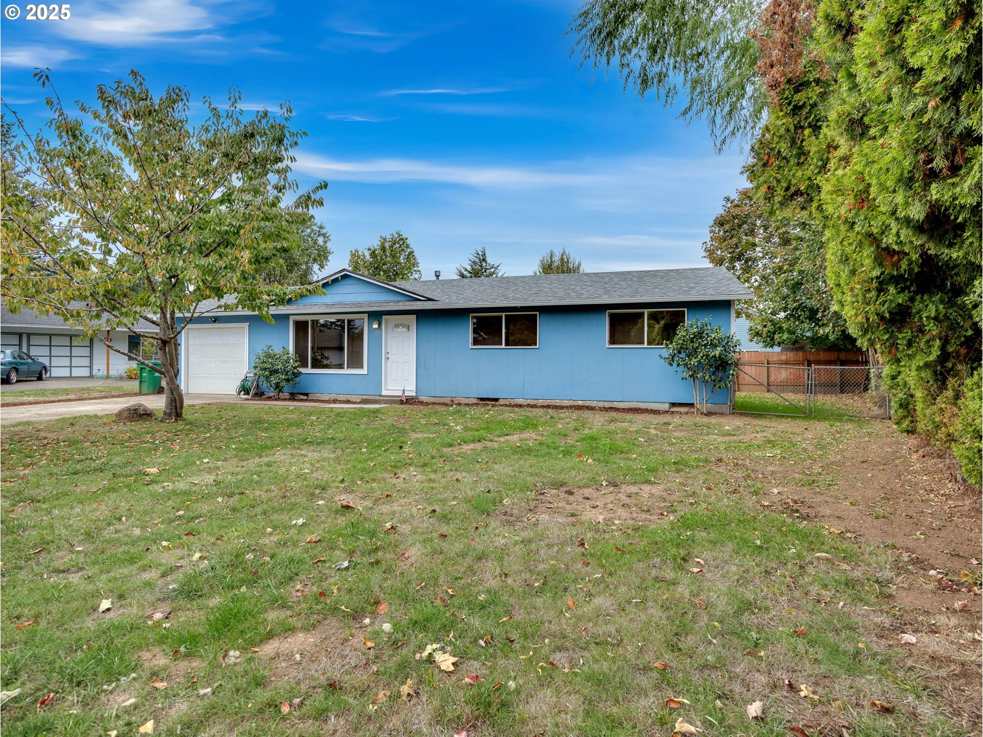 821 Southwest 14th Street Troutdale, OR 97060 - Photo 3 of 27 a front view of a house with a yard