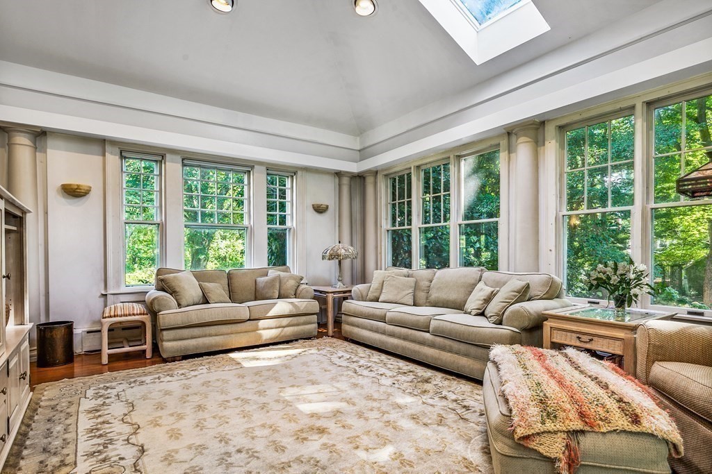 216 Spring Street Marshfield, MA 02050 - Photo 17 of 36 a living room with furniture and large windows