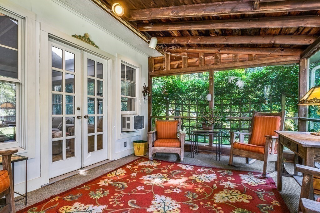 216 Spring Street Marshfield, MA 02050 - Photo 18 of 36 a backyard of a house with outdoor seating